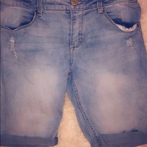 Lightly worn blue denim shorts